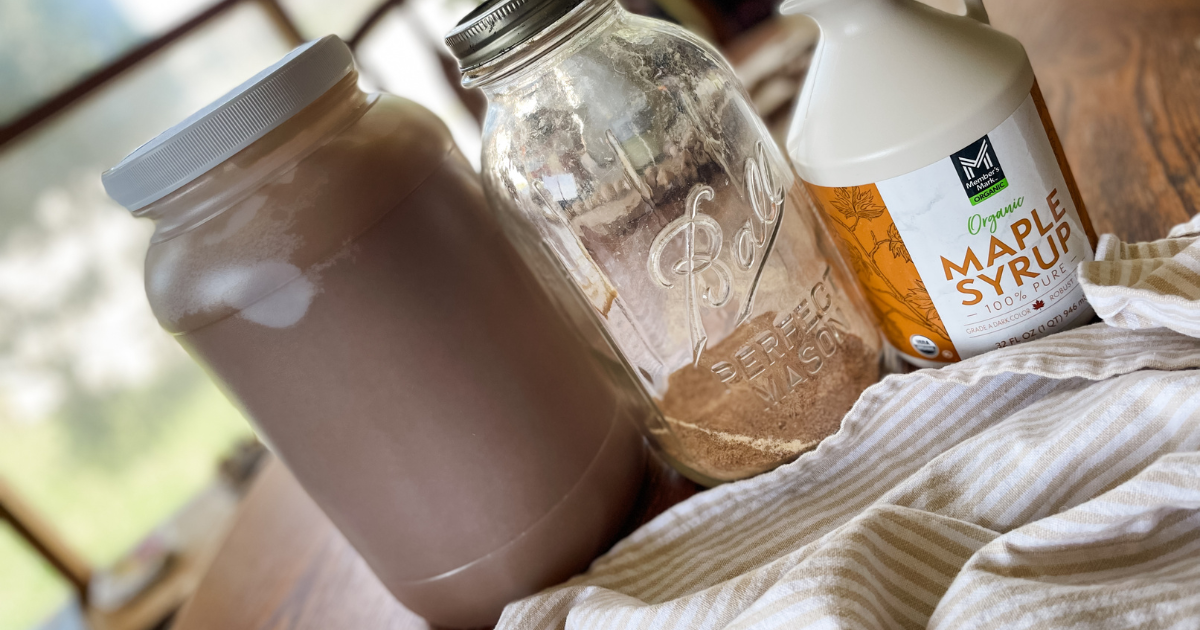 honey, coconut sugar, and maple syrup sitting on a table