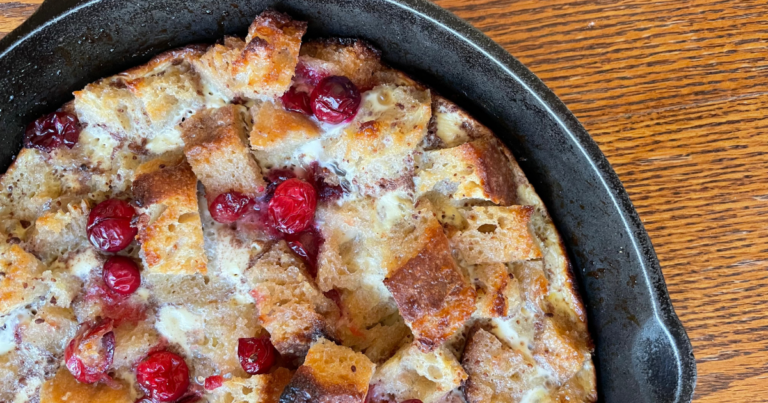 french toast and cranberries in a skillet